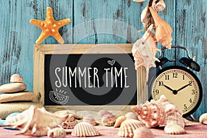 Text summer time in a chalkboard