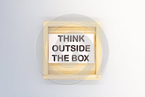 The text think outside the box . Life and business motivational inspirational concept