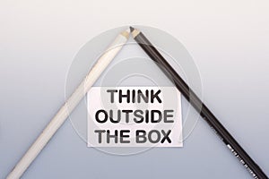 The text think outside the box . Life and business motivational inspirational concept