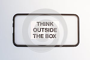 The text think outside the box . Life and business motivational inspirational concept