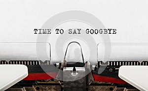 Text Time to Say Goodbye typed on typewriter