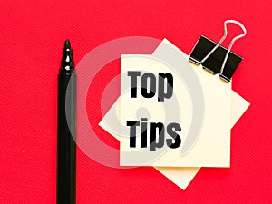 Text Top Tips written on paper notes