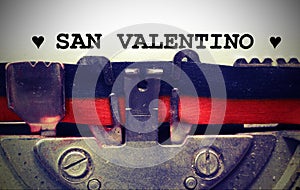 text by typewriter Saint Valentine in black ink with vintage ton photo