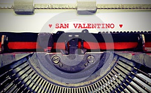 Text by typewriter Saint Valentine and hearts with vintage toned photo