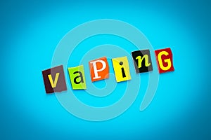 Text - vaping from colorful letters on blue background. Single word on banner. Headline, card with inscription. Message on poster. photo