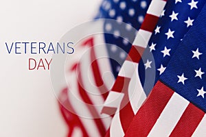 Text veterans day and american flags