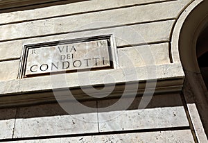 text VIA CONDOTTI  on the historic building of the famous street photo