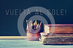 The text vuelta al cole, back to school in spanish, written in a