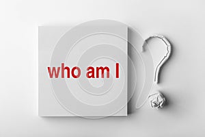 Text Who Am I and Question Mark photo