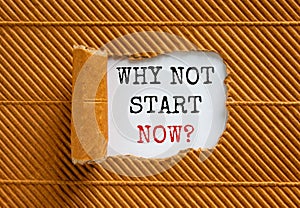 The text `why not start now` appearing behind torn brown paper. Beautiful background. Business concept