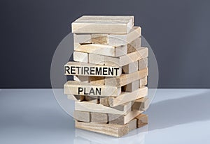 The text on wooden blocks RETIREMENT PLAN