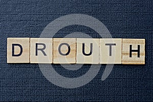 Text on word drouth from gray wooden letters