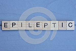 text the word epileptic from brown wooden small letters