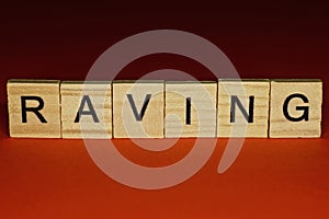 Text the word raving from gray wooden small letters