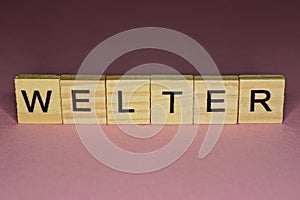 Text the word welter from gray wooden small letters photo