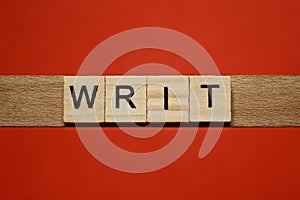 Text the word writ from gray wooden small letters photo