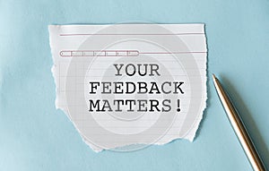 Text your feedback matters on white paper background, business concept