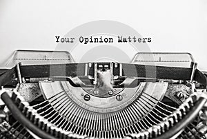 Text Your Opinion Matters typed on vintage typewriter retro. Close up