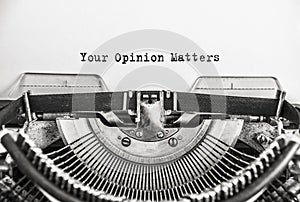 Text Your Opinion Matters typed on vintage typewriter retro. Close up photo