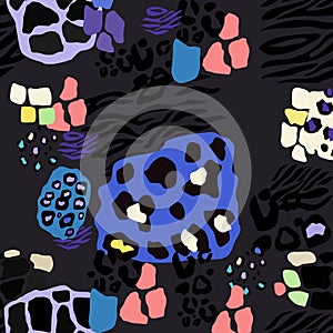 Textile art featuring colorful leopard print on a zebra background