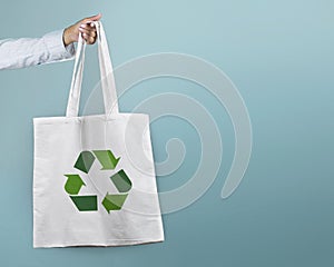 Textile bag with recycle logo. Bio container with sign.Environment save sign.Recycling concept