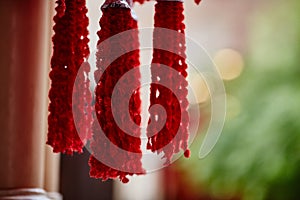 Textile decorations hanging inside Indian temple macro