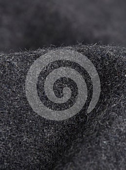 Textile grey fibers close-up, macro photography with volumes