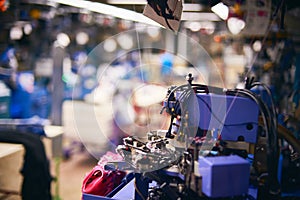 Textile industry with knitting machines in factory close up