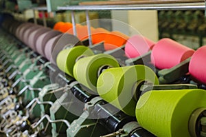 Textile industry - spinning machine in a textile factory photo