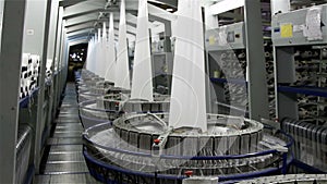 Textile industry - yarn spools on spinning machine