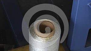 Textile industry - yarn spools on spinning machine