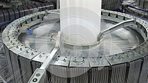 Textile industry - yarn spools on spinning machine