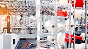 Textile Manufacturing. Circular knitted fabric. Textile factory in spinning production line and a rotating machinery and equipment