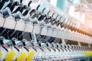 Textile Manufacturing. Circular knitted fabric. Textile factory in spinning production line and a rotating machinery and equipment