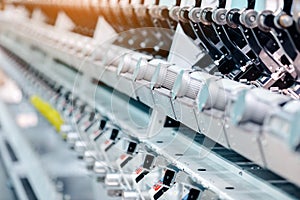 Textile Manufacturing. Circular knitted fabric. Textile factory in spinning production line and a rotating machinery and equipment