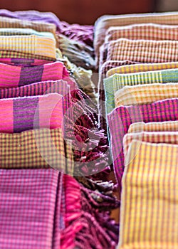 Textile Native, Colorful scarf and fabric souvenir silk weaving at small village Crafts. Siem Reap, Cambodia