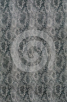 Textile with scale-like vertical texture of snake