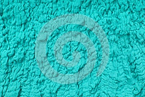 Textile seagreen colour background, turquoise cloth as creative backdrop,   beautiful  draped bright material, abstract drape