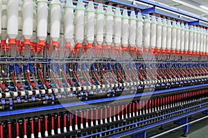 Textile spindles on the production line