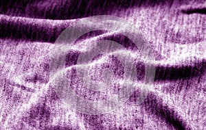 Textile texture with blur effect in purple color