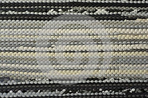 Textile texture fabric horizontal lines cotton handmade recycle carpet, rug, gray color. Zero waste