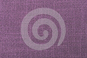Textile Violet color rough weaving thread texture close-up