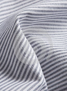 Textile - white and black shirt fibers close-up, macro photography with volumes