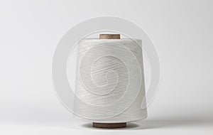 Textile white spool on isolated white background