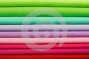Textiles in green, pink and red tones
