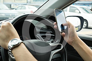 Texting while driving photo