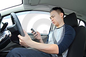 Texting on phone while driving