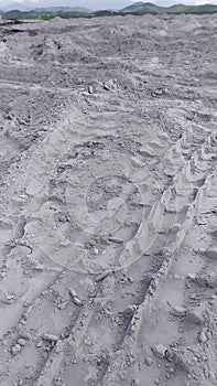 Textura de huellas de camiÃÂ³n en la arena. Texture of truck tracks in the sand. photo