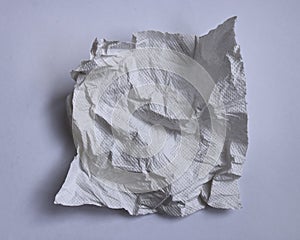 Textural of crumpled tissue paper in white and grey tone.