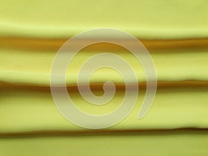 Texture abstract background of yellow cloth with three lines